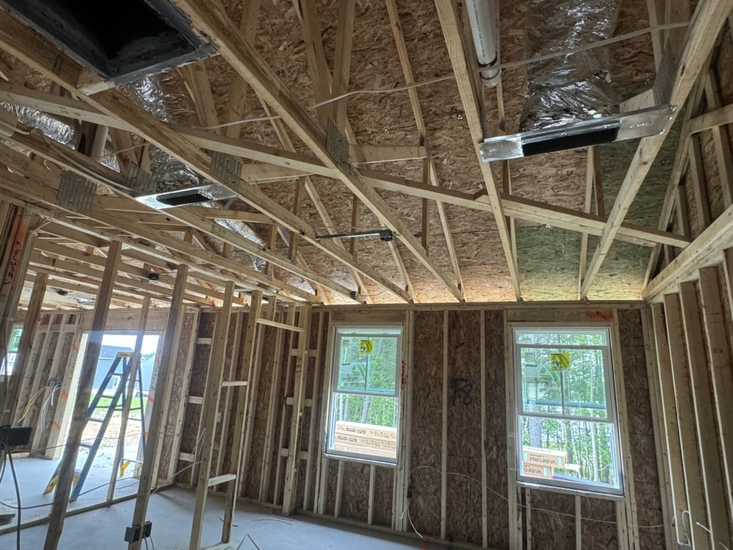 Interior view of a new construction home during a pre-drywall inspection in the 78 North neighborhood, Sanford, NC, focusing on framing quality and structural integrity.
